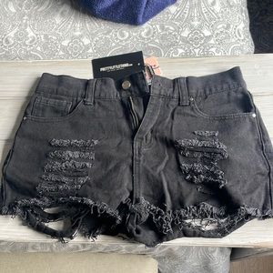 Pretty little thing shorts size 4 never used